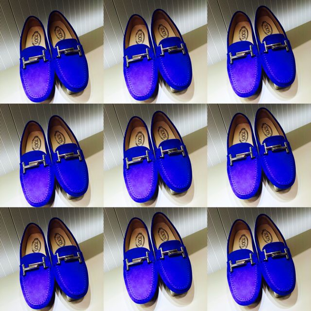 A collage of blue loafers from Tod's.